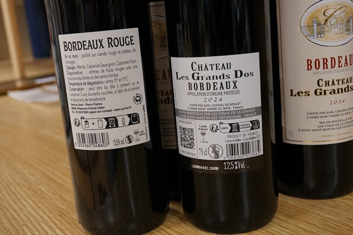 Eight bottles of Chateau Les Grands 2024, and a bottle of Bordeaux 2022